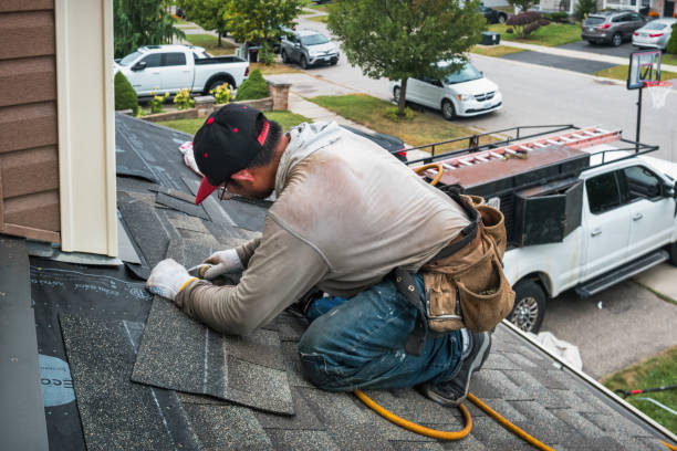 Professional Roof Replacement technician working in Hackett, AR
